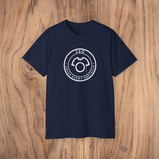 Navy blue t-shirt with a white logo on a wooden surface